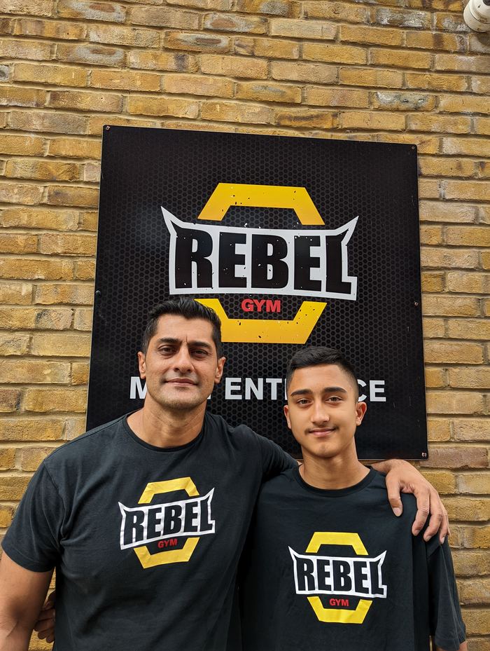 Rebel Gym members outside the gym entrance