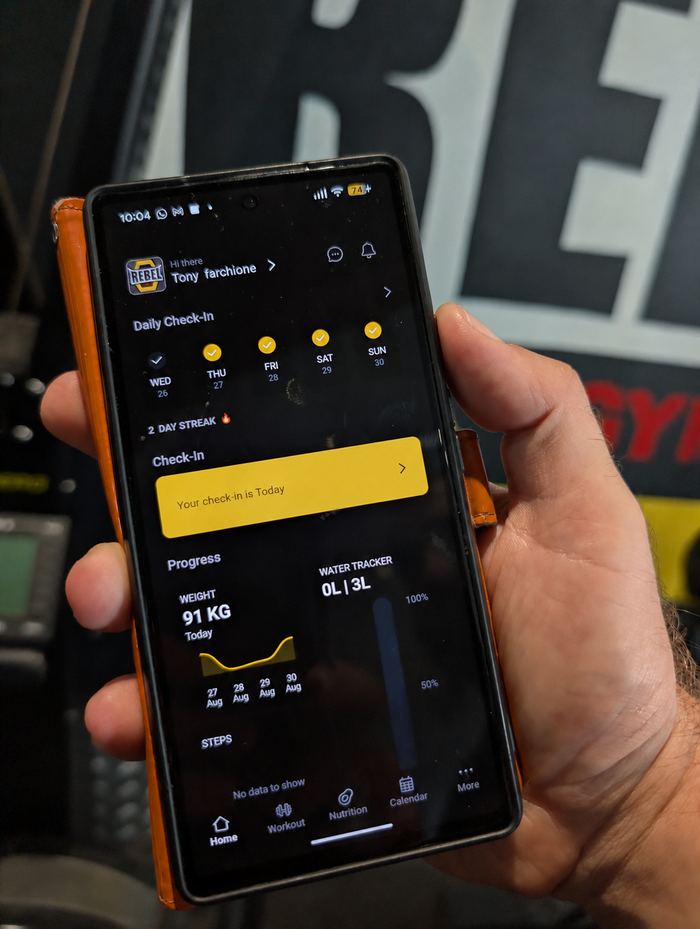 Rebel Gym training app on a member's phone